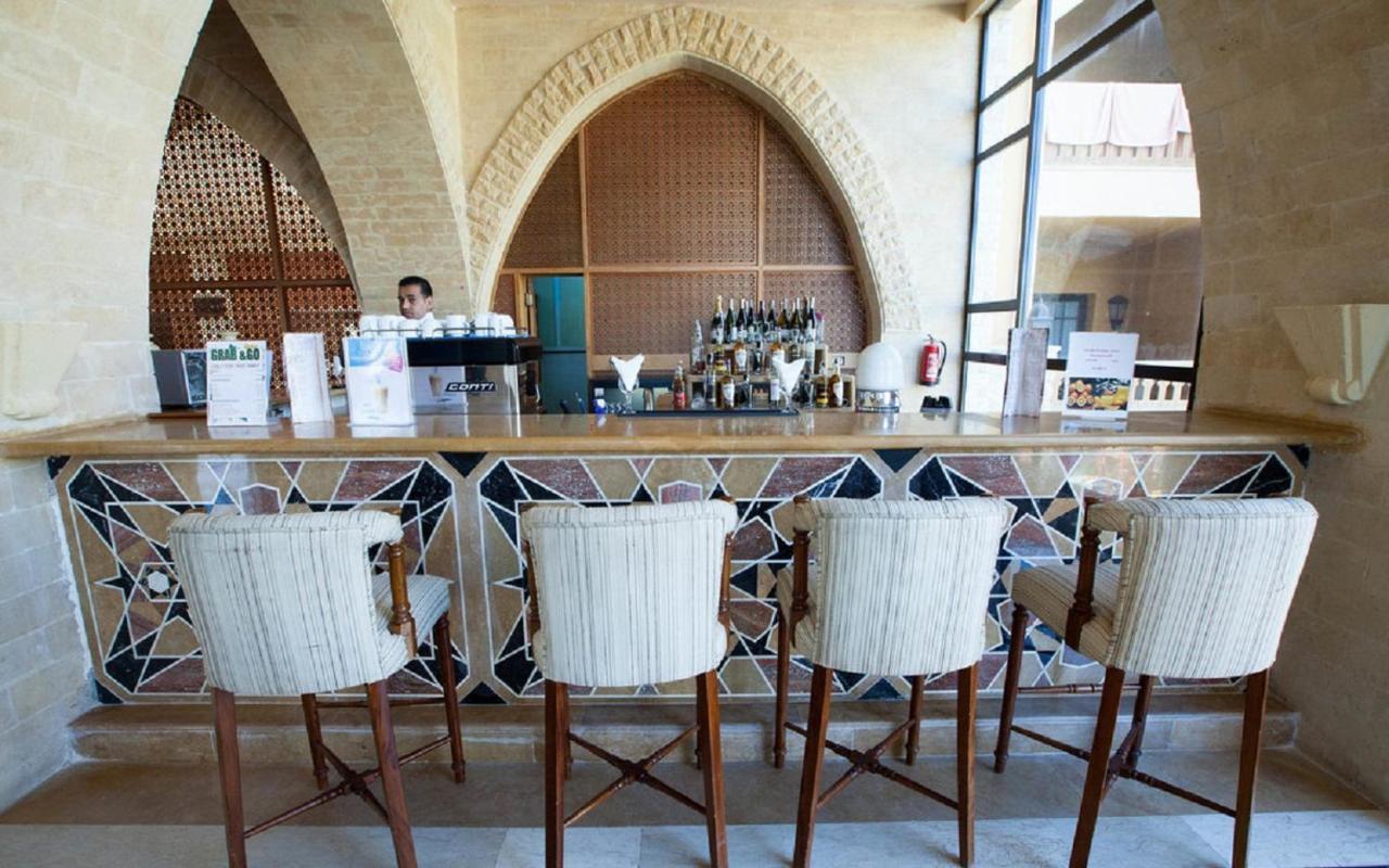 Grand Waterworld Makadi Family Star - Couples And Families Only Hotel Hurghada Eksteriør billede The bar at the restaurant