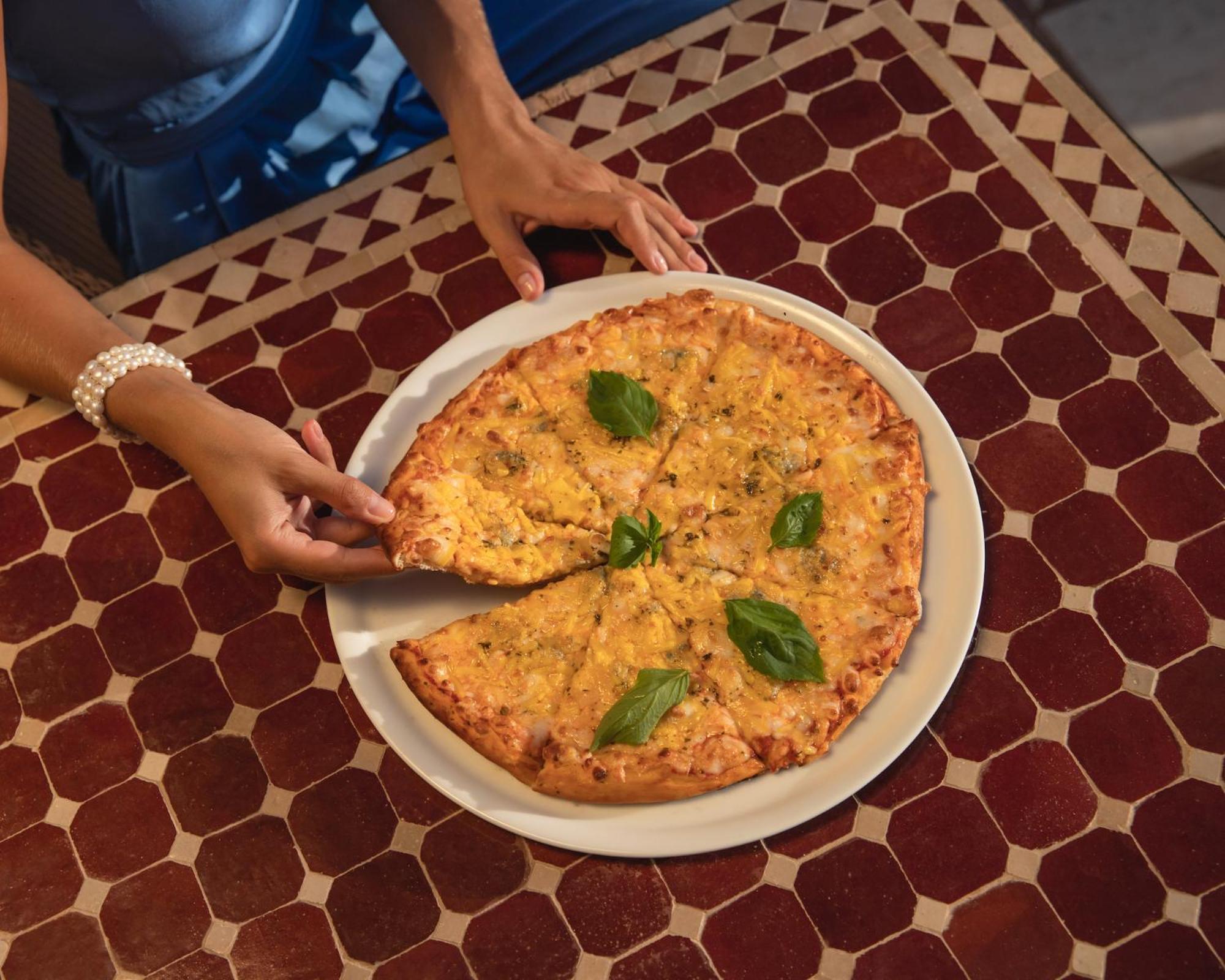 Grand Waterworld Makadi Family Star - Couples And Families Only Hotel Hurghada Eksteriør billede Pizza