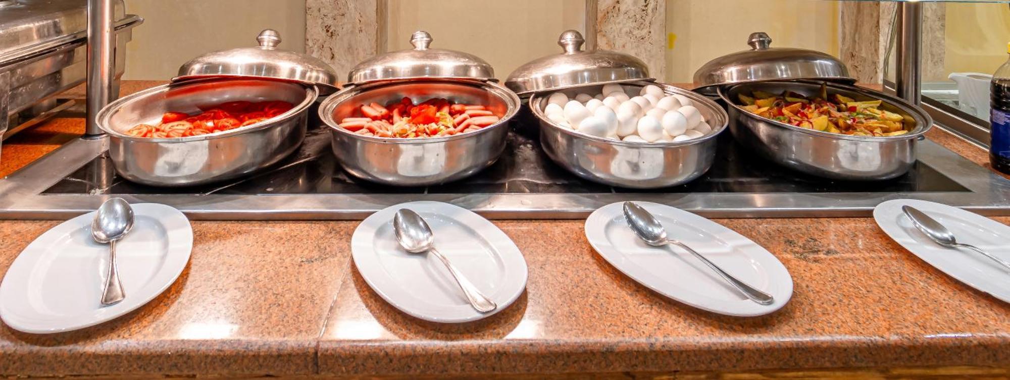 Grand Waterworld Makadi Family Star - Couples And Families Only Hotel Hurghada Eksteriør billede A chafing dish